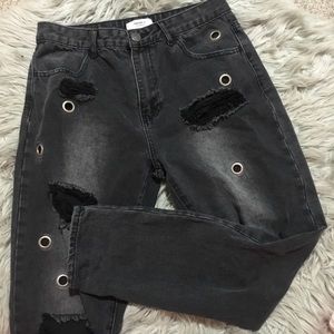 black distressed jeans with metal detailings